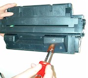 burning a hole to reill your toner cartridge