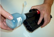 refill a toner cartridge - pouring toner powder